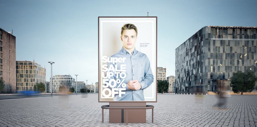 Street billboard advertising a sale