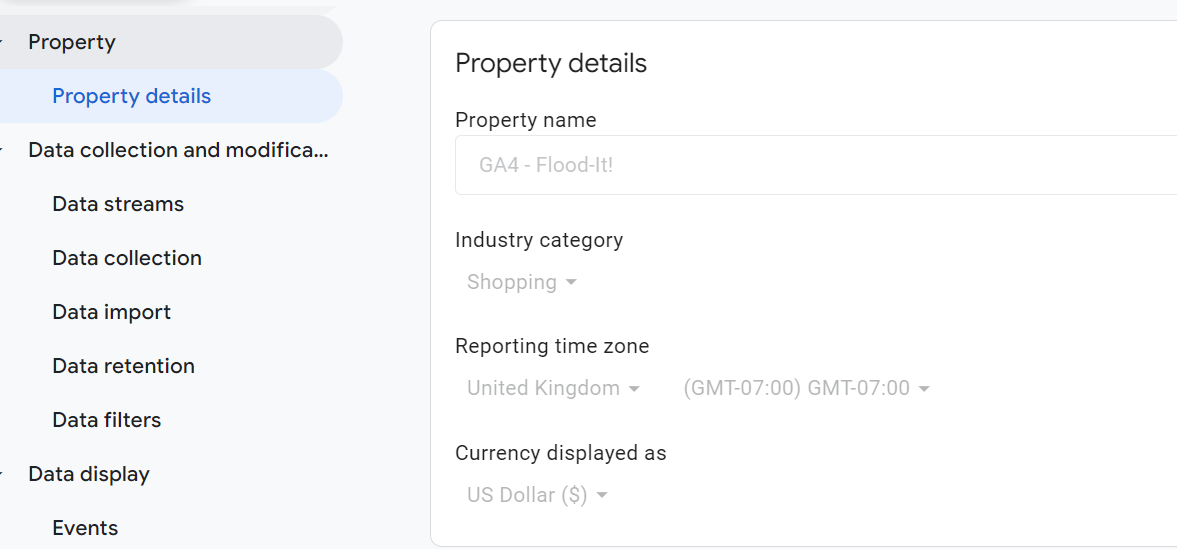 Google Analytics 4 property details page displaying industry category as Shopping, time zone set to GMT+07:00, and currency in USD. i-shadow
