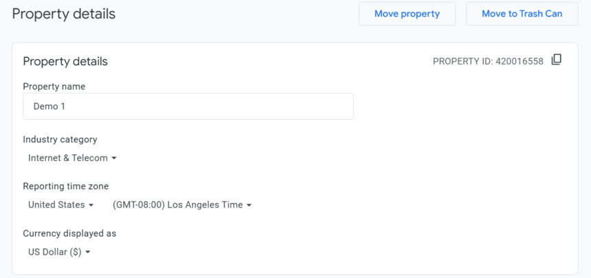Overview of property settings including name, industry, timezone, and currency display. i-shadow