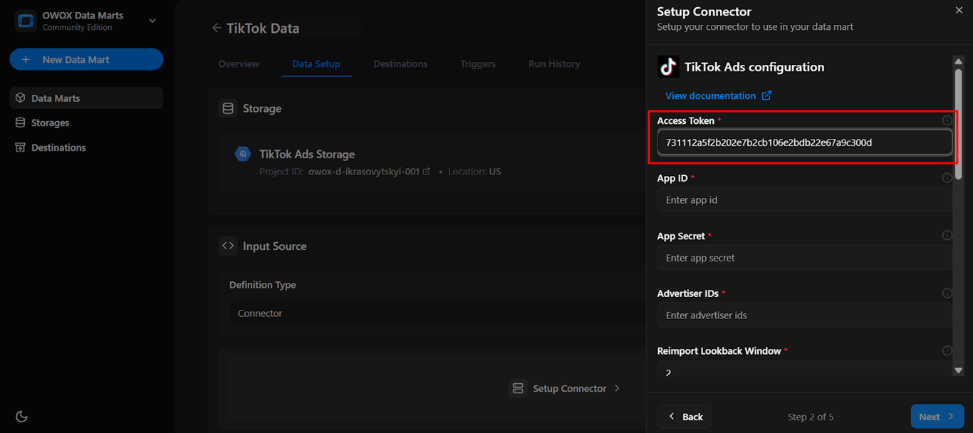 OWOX connector configuration panel with the TikTok Ads access token field filled in for authentication. i-shadow