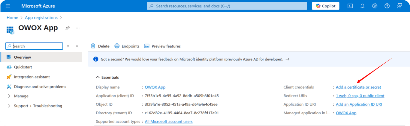 Microsoft Azure App registration page showing OWOX App with an arrow pointing to “Add a certificate or secret” under Client credentials. i-shadow