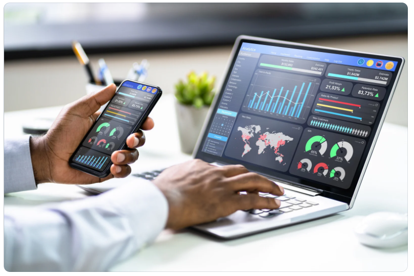 Business dashboards with performance metrics, reviewing real-time analytics and data visualization charts for reporting and decision-making. i-radius