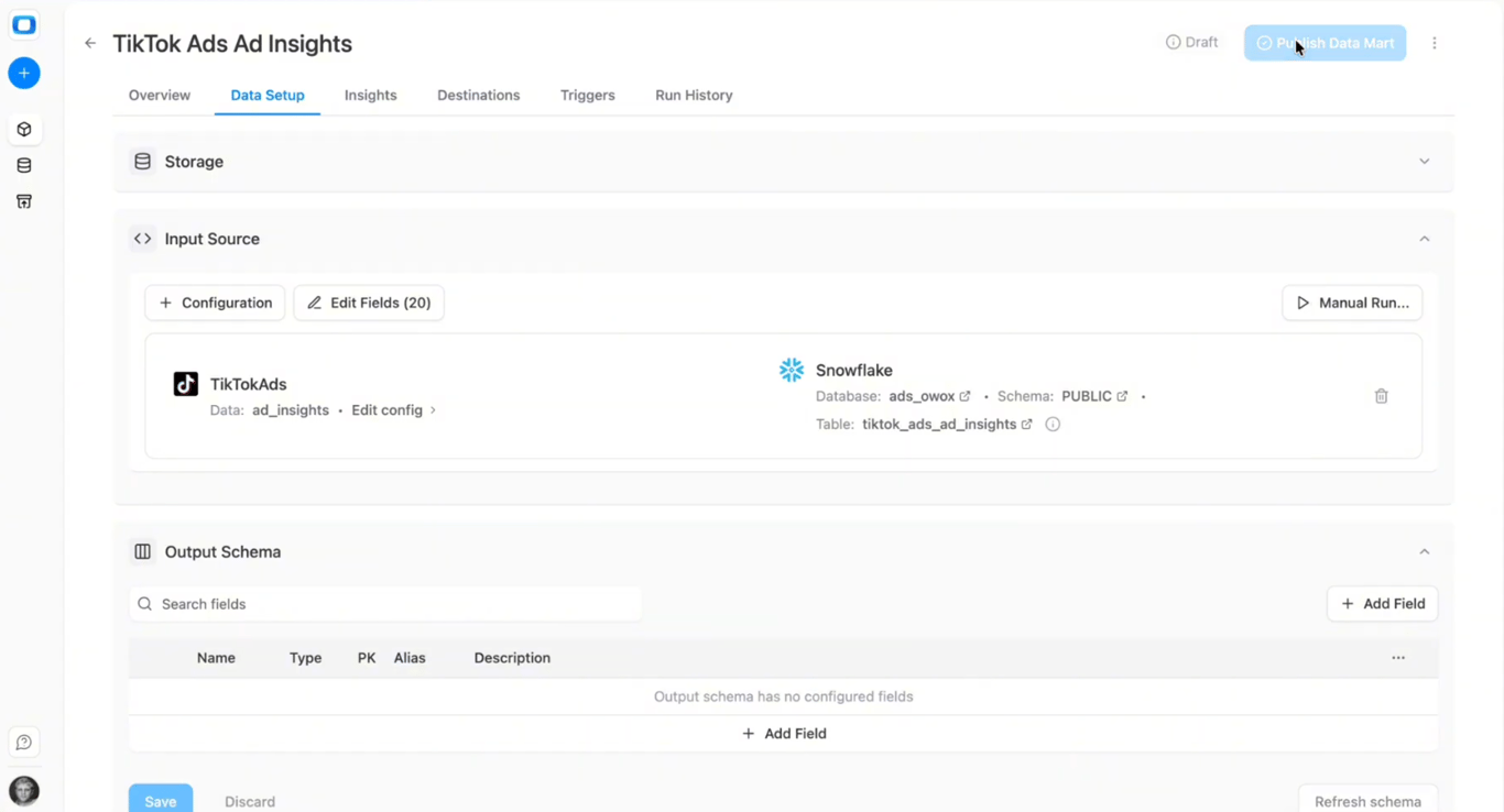 Snowflake destination configuration in OWOX Data Marts showing database, schema, and table selection for TikTok Ads data. i-shadow