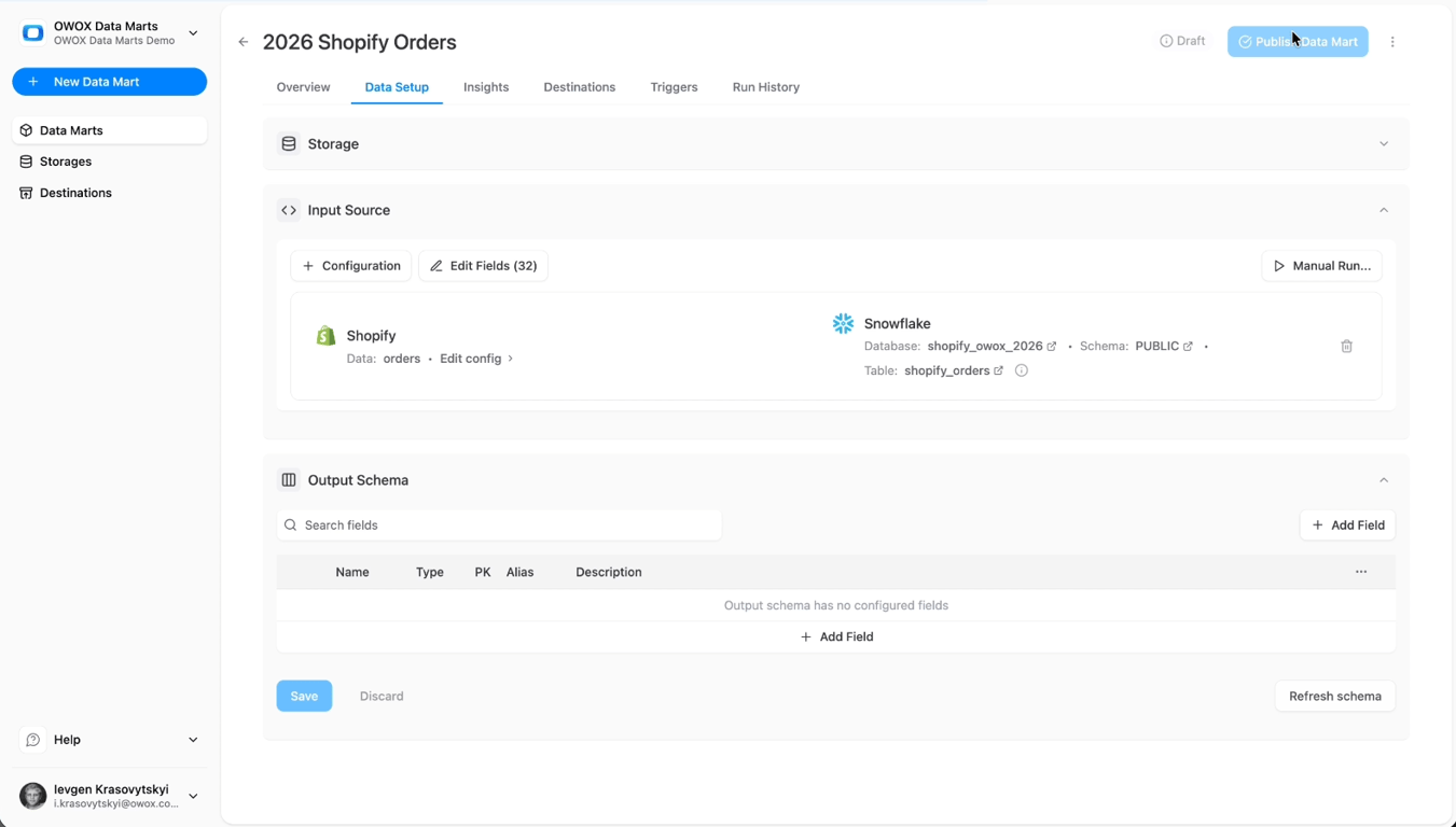 Snowflake destination configuration in OWOX Data Marts showing database, schema, and table setup for Shopify data loading. i-shadow i-radius