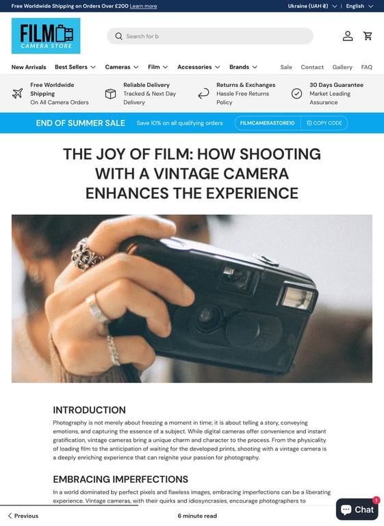 A website page discussing the experience of shooting with vintage cameras, featuring a close-up image of a person holding a film camera. i-shadow