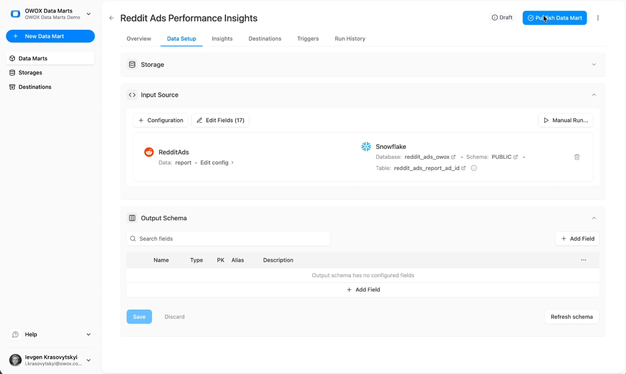 Snowflake destination configuration in OWOX Data Marts showing database, schema, and table setup for Reddit Ads data loading. i-shadow i-radius