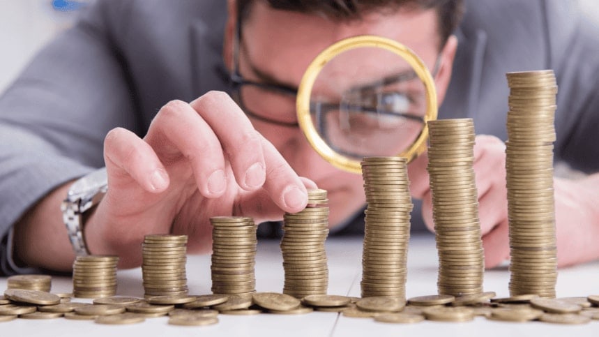  Analyzing cost management and control, represented by  stacking coins in ascending order. i-radius